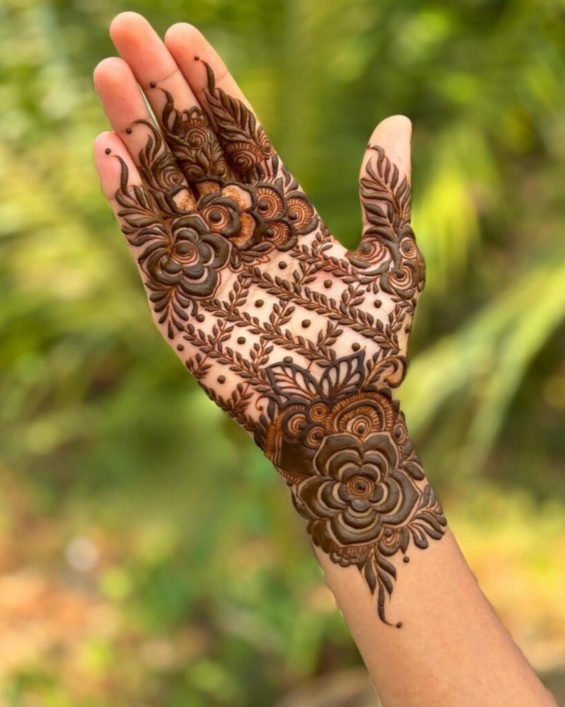 Regal Rose Jaali Mehndi Design With Cityscape At The Top